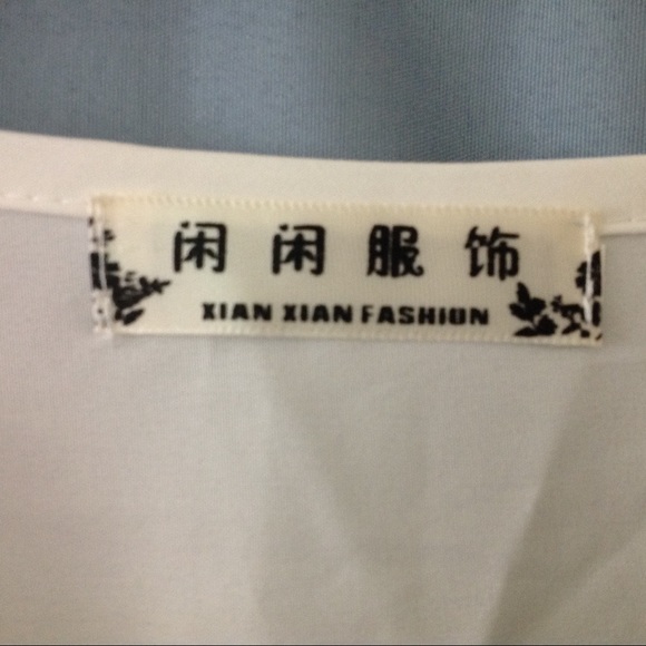 Stunning XIAN XIAN cream embroidered blouse - Picture 7 of 8